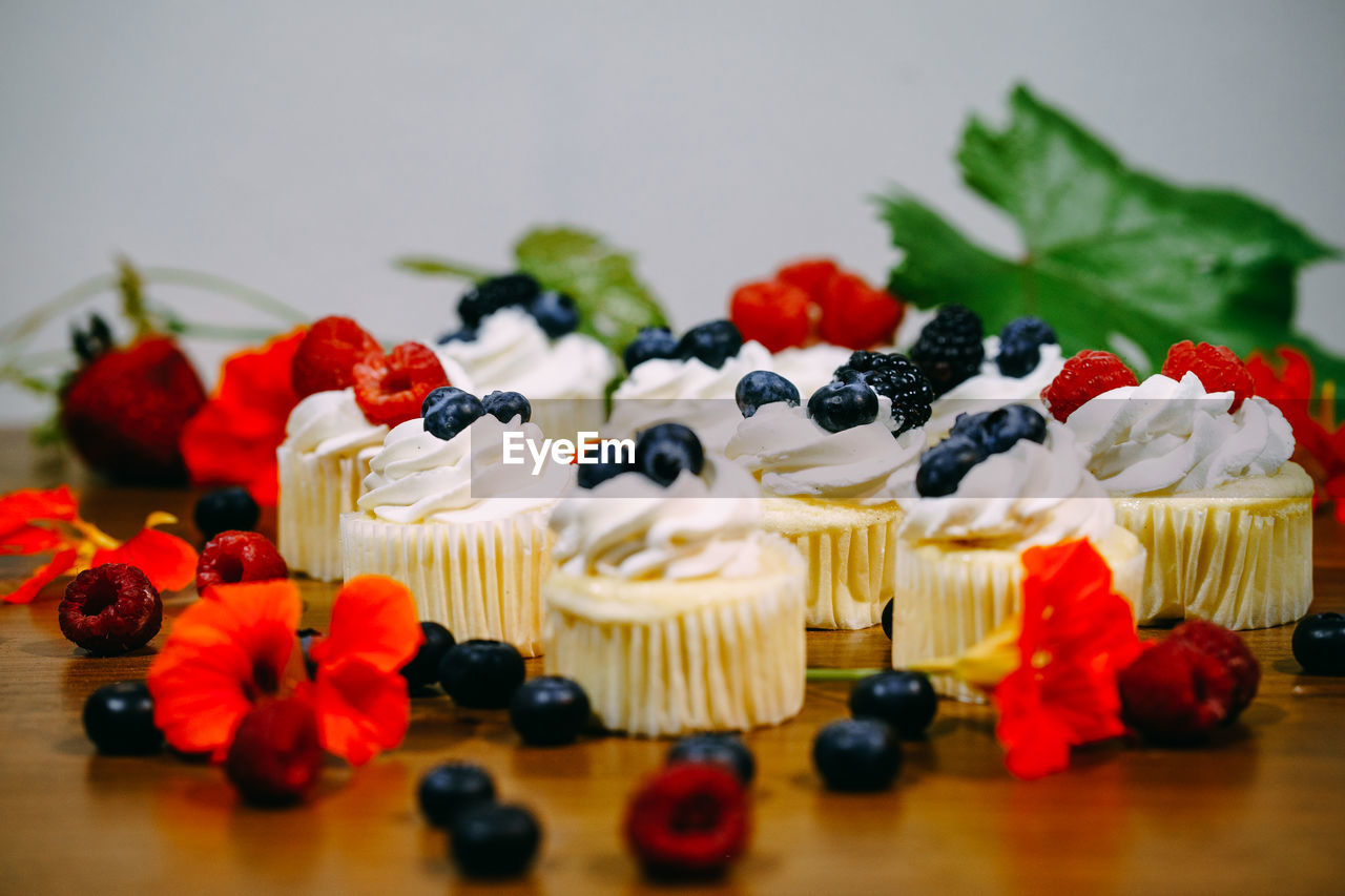 CLOSE-UP OF CAKE WITH FRUITS AND VEGETABLES