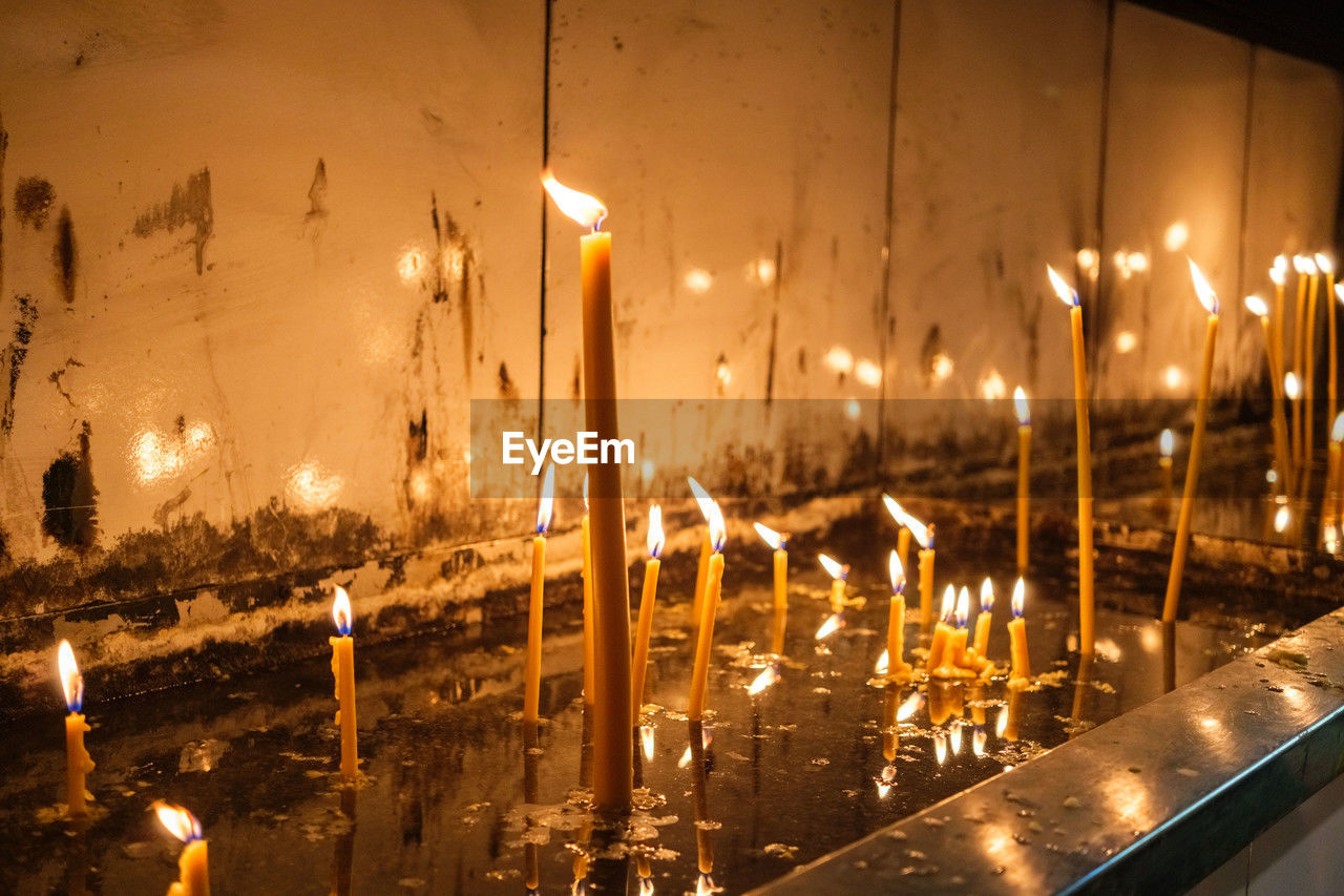 close-up of illuminated candles