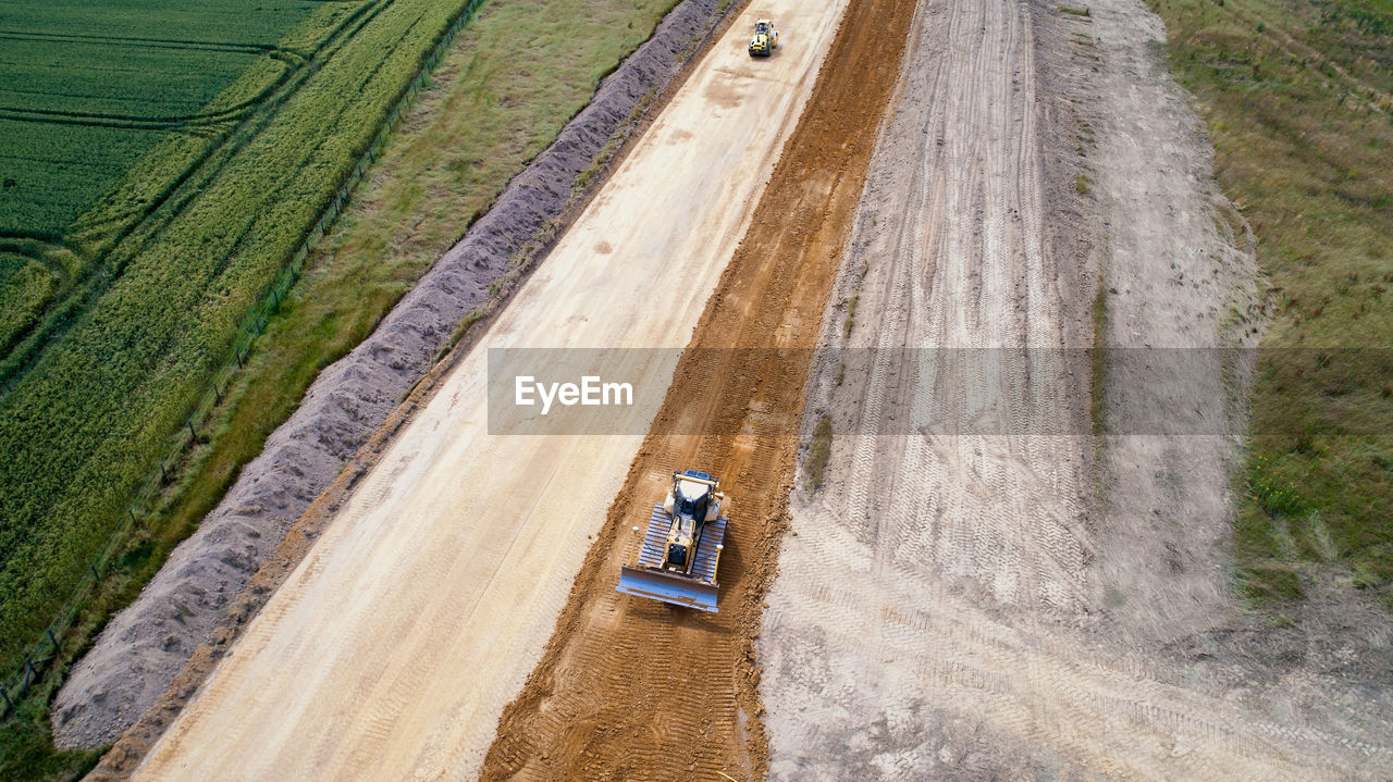 Aerial view of bulldozer on dirt road