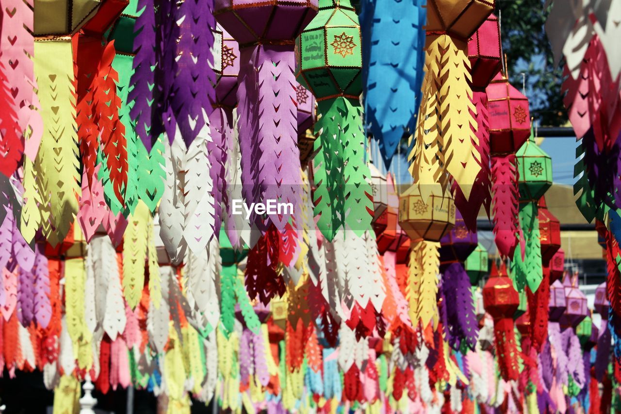 hanging, multi colored, no people, large group of objects, day, abundance, variation, tradition, retail, market, full frame, outdoors, decoration, for sale, low angle view, architecture, built structure, backgrounds, textile, creativity