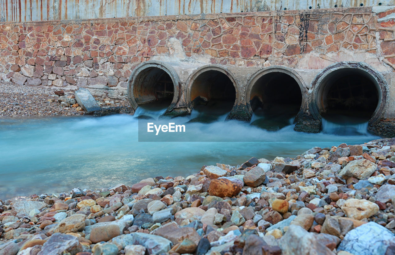 Water flowing from sewage pipe