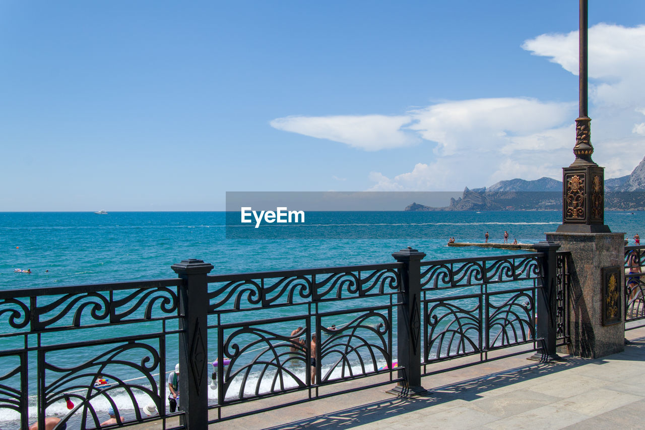 Scenic view of sea against sky from embankment