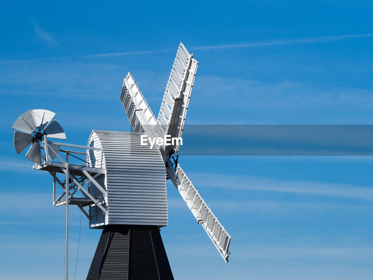 Low angle view of wimbledon windmill against sky