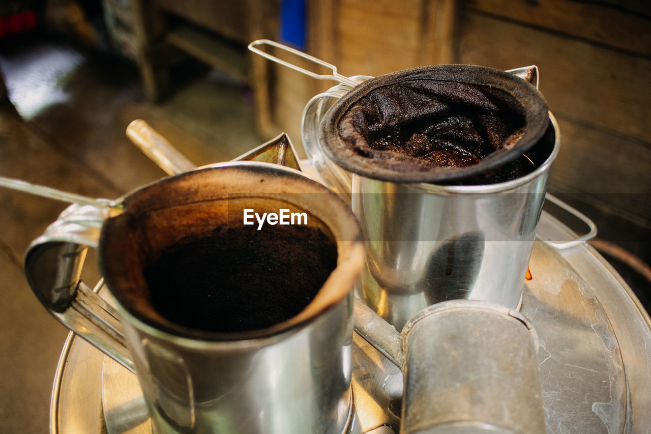 Close-up of classic asian coffee preparation.