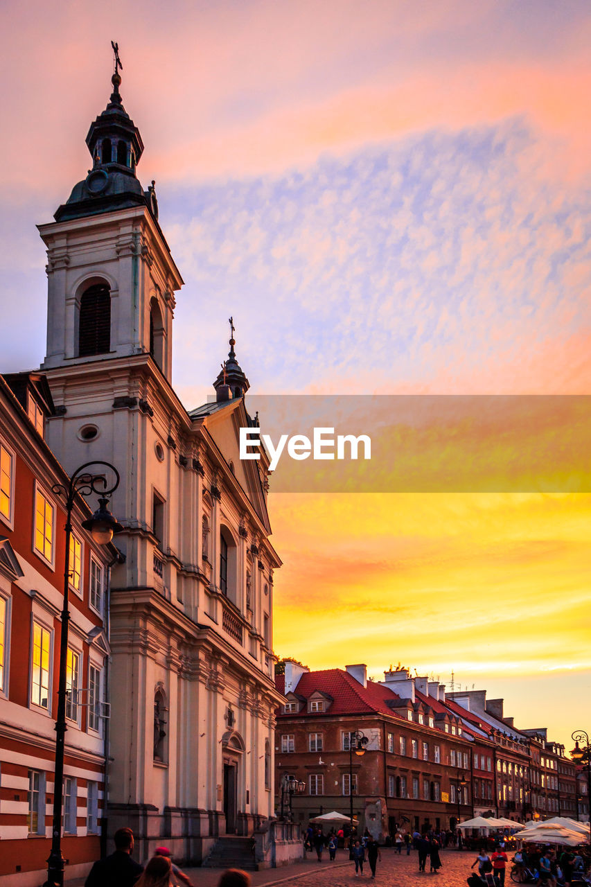 BUILDINGS AGAINST SKY DURING SUNSET