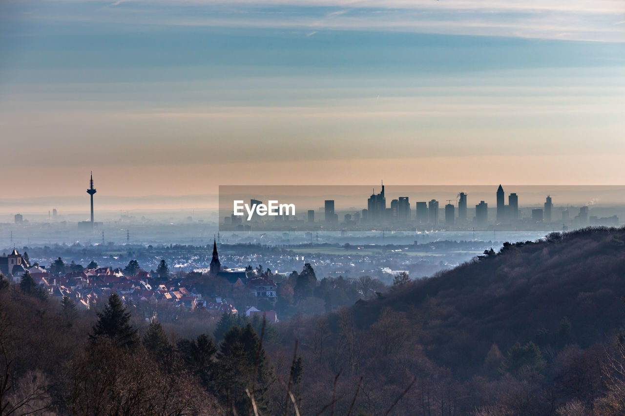 Panoramic view of buildings against sky during sunset