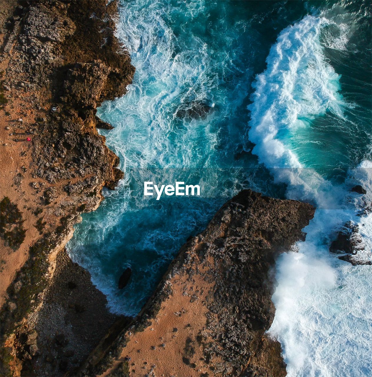 High angle view of rocks and sea