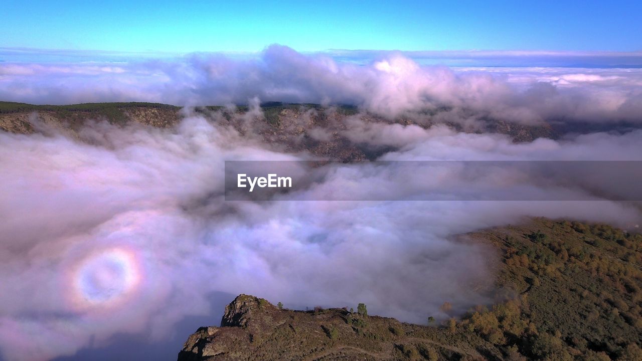 High angle view of smoke at volcanic mountain