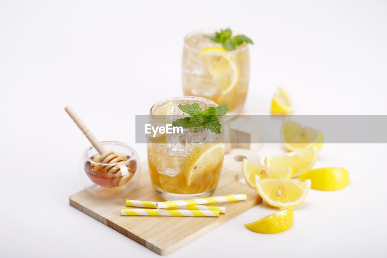 CLOSE-UP OF GLASS OF JUICE