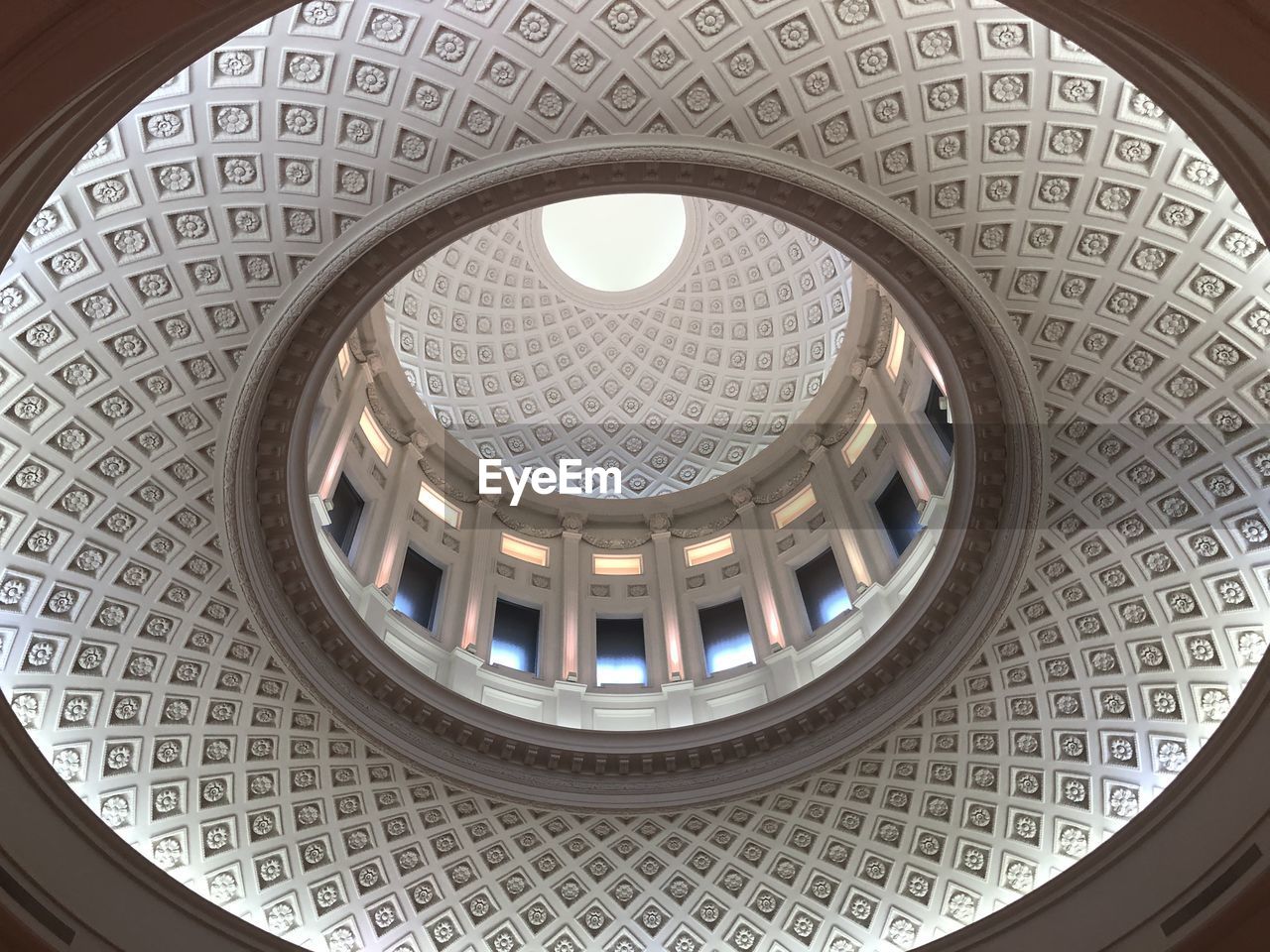 DIRECTLY BELOW SHOT OF SKYLIGHT IN BUILDING