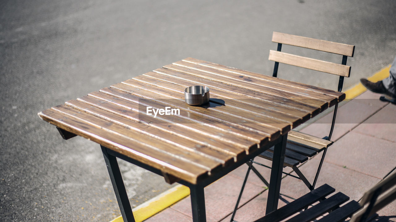 High angle view of empty bench on table