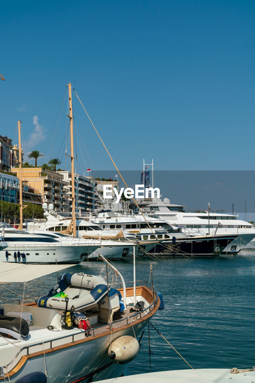 boats in sea against sky