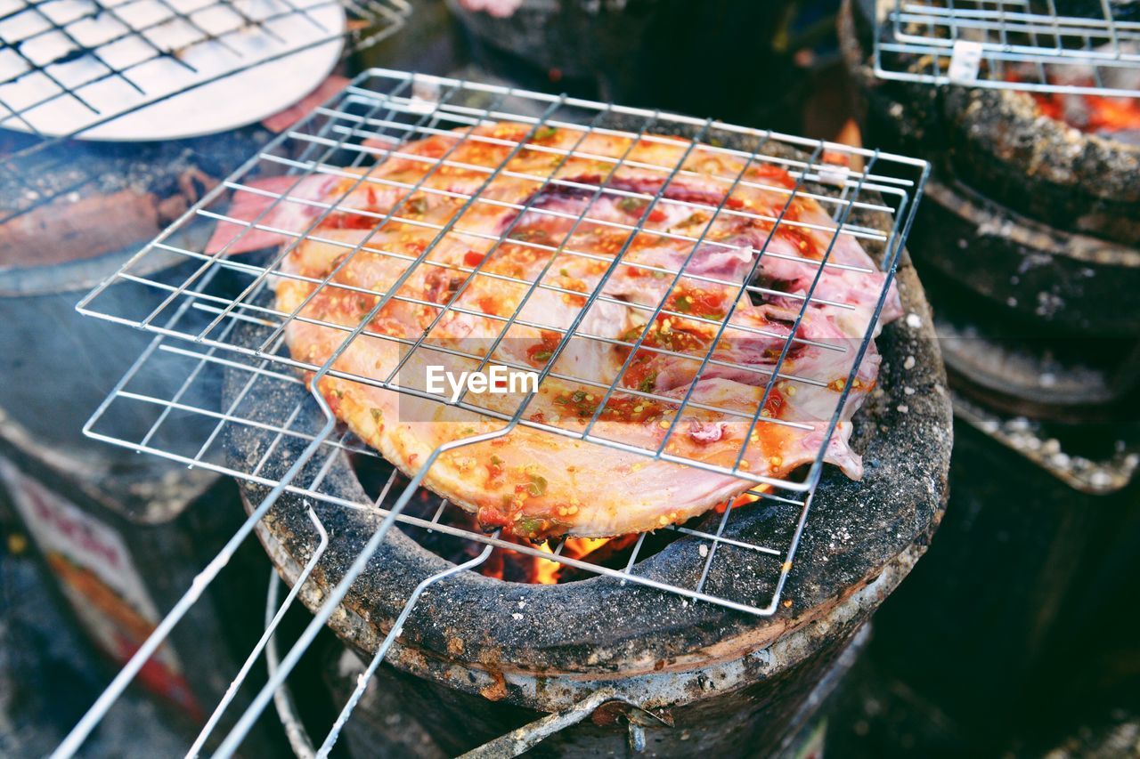 High angle view of pizza on barbecue grill