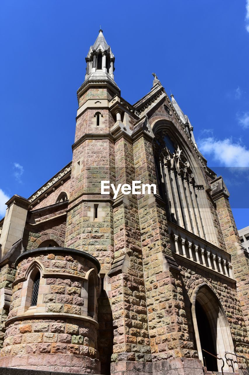 LOW ANGLE VIEW OF A BELL TOWER