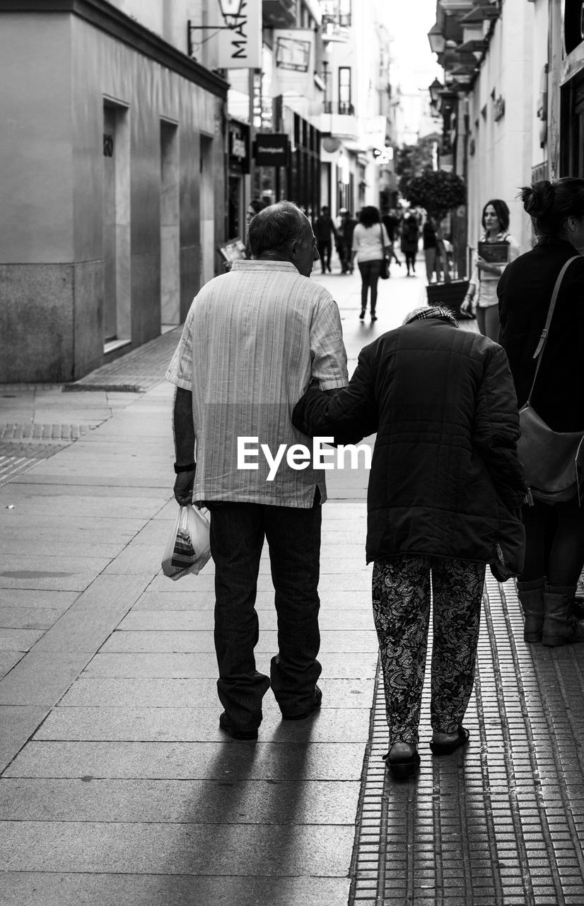 WOMAN WALKING ON STREET