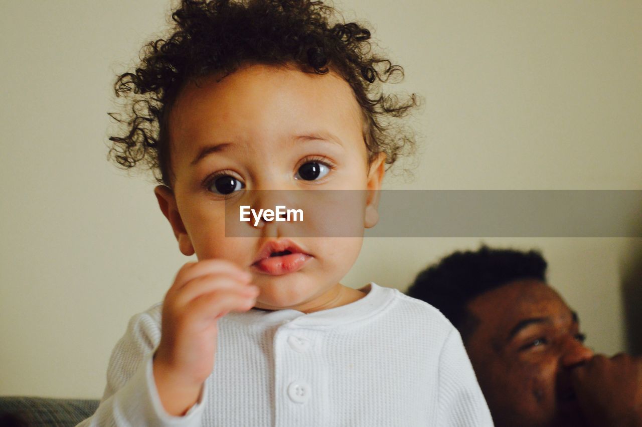 CLOSE-UP PORTRAIT OF CUTE BABY GIRL