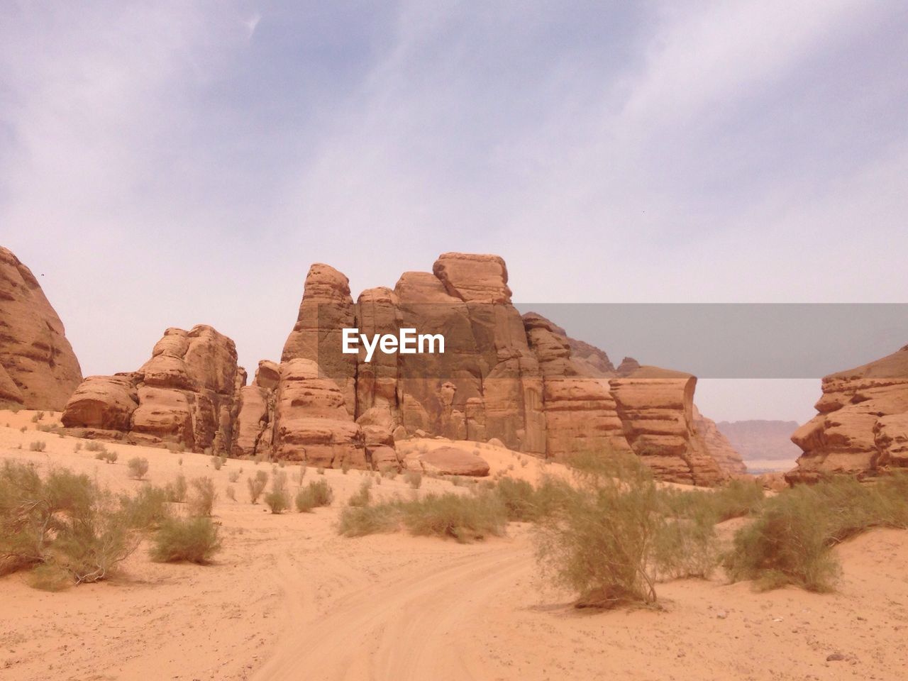 Rock formations in desert against sky