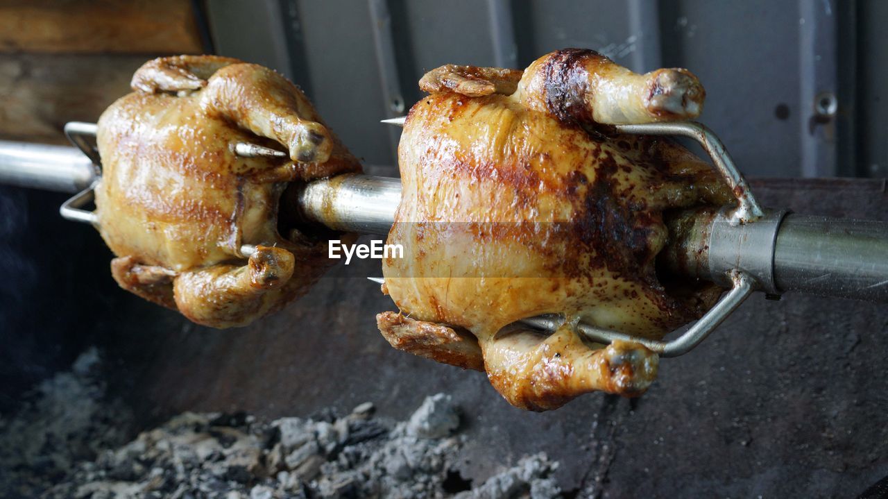 Close-up of chicken on barbecue grill