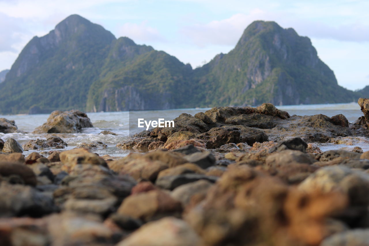 SURFACE LEVEL VIEW OF ROCKS AND SEA