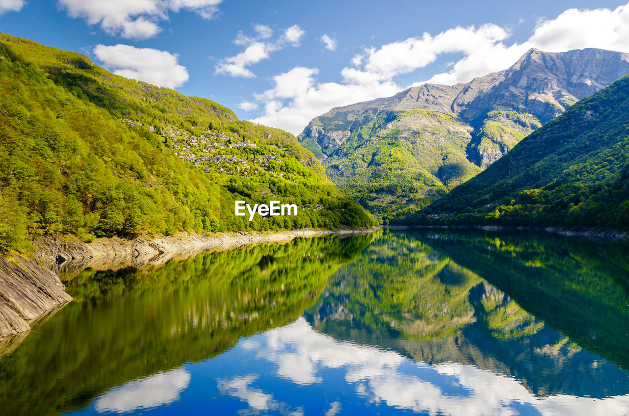 Scenic view of lake with mountains in background