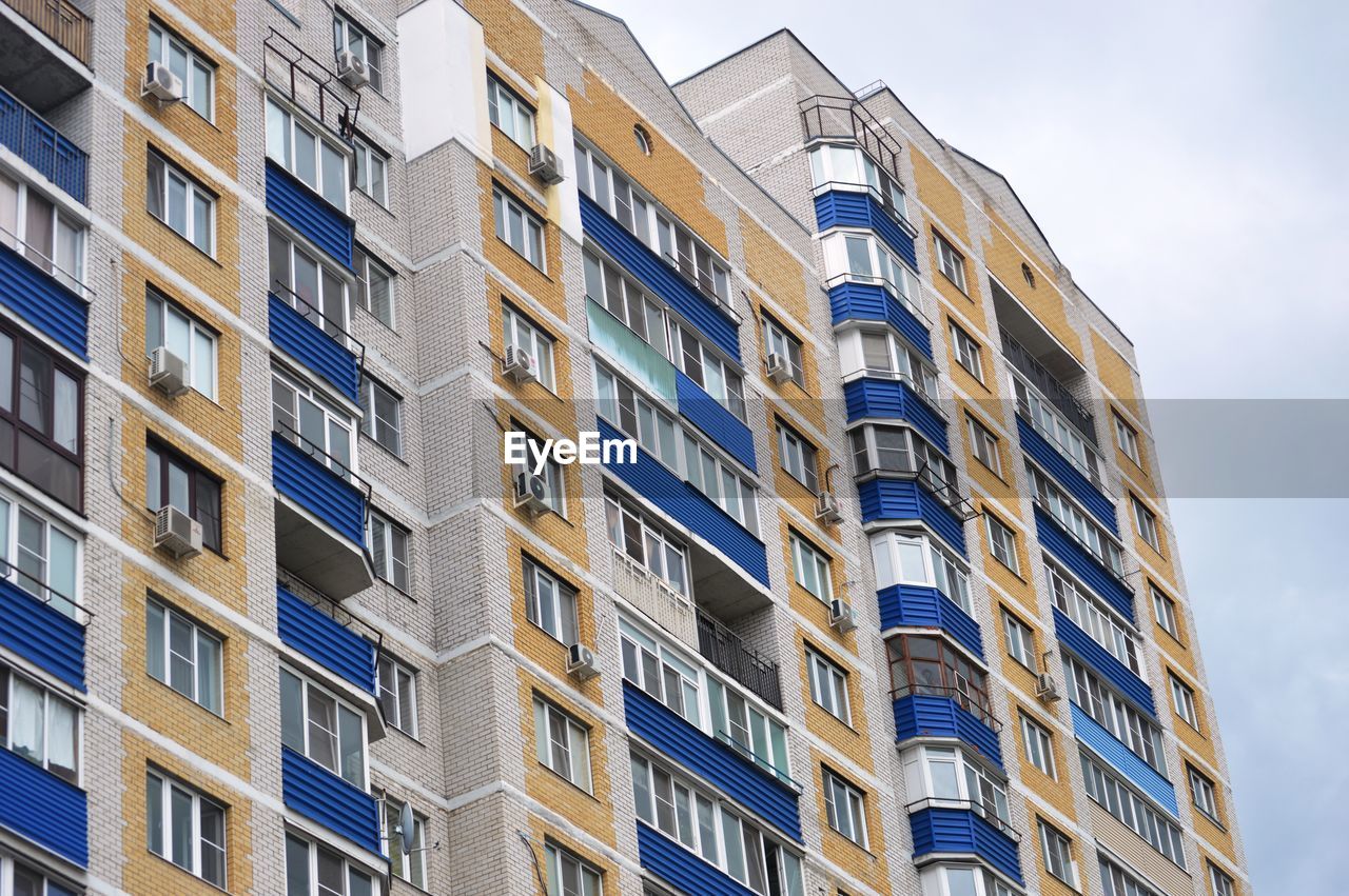 Low angle view of residential building against sky