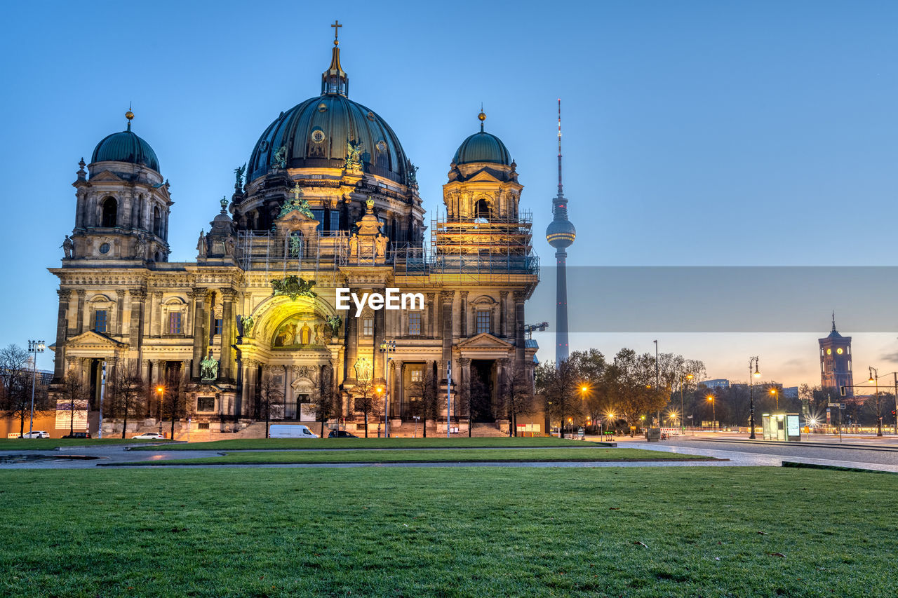 The lustgarten with the cathedral and the famous tv tower in the back before sunrise, seen in berlin