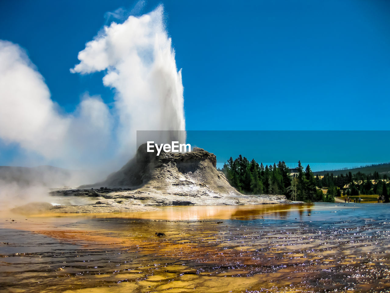 Geyser spraying at yellowstone national park