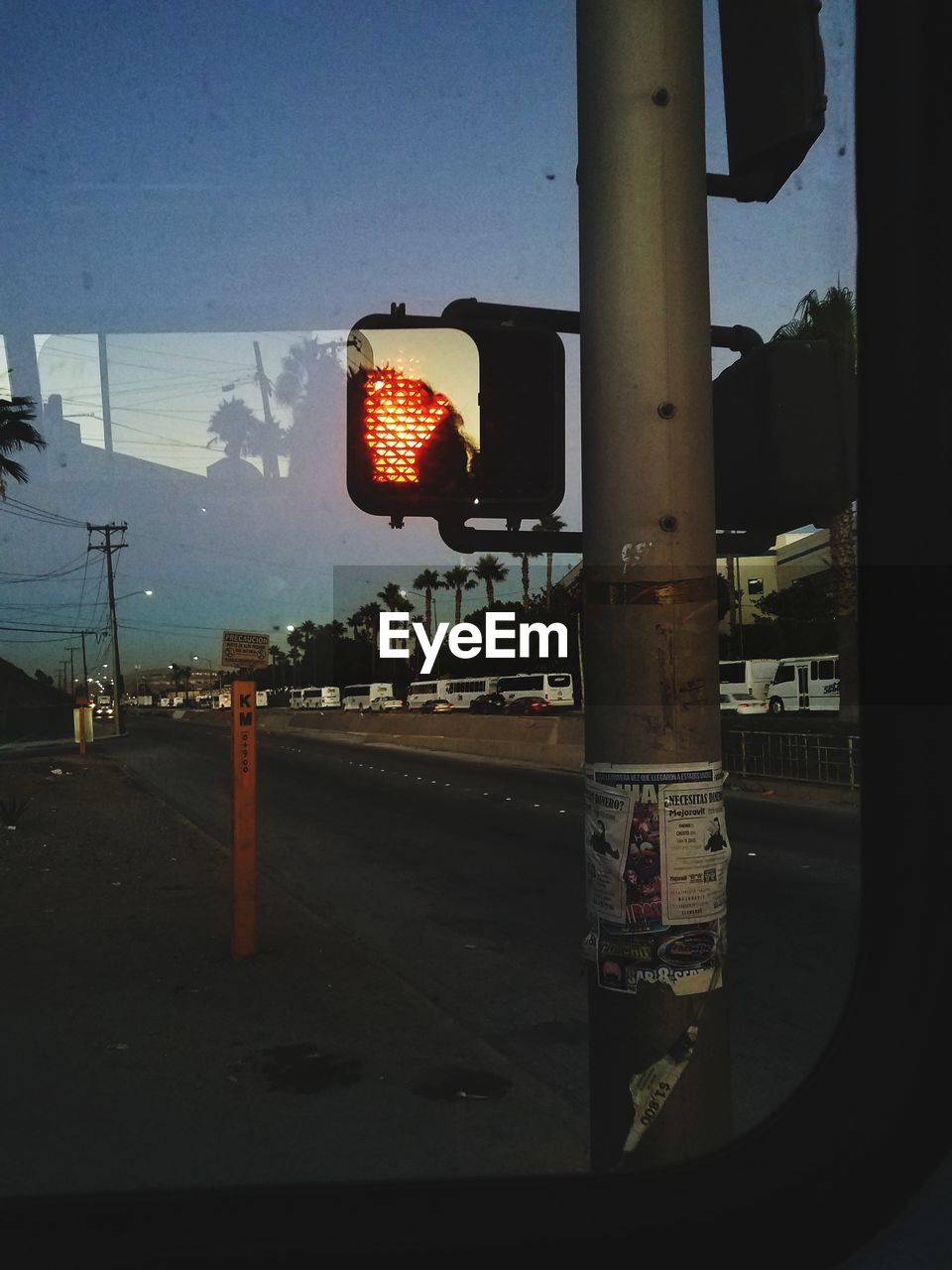ROAD SIGN AGAINST SKY