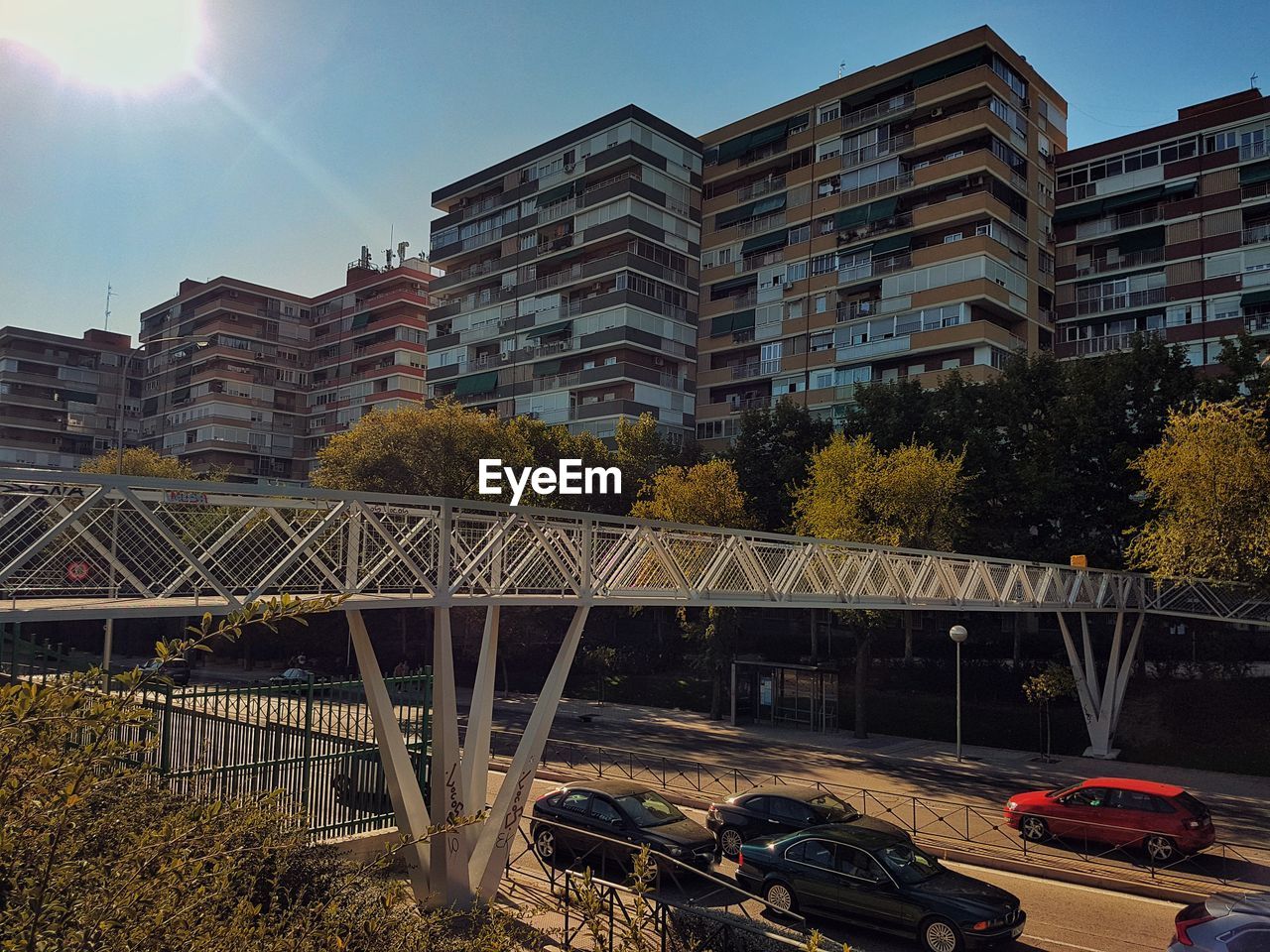 BRIDGE AND BUILDINGS AGAINST SKY