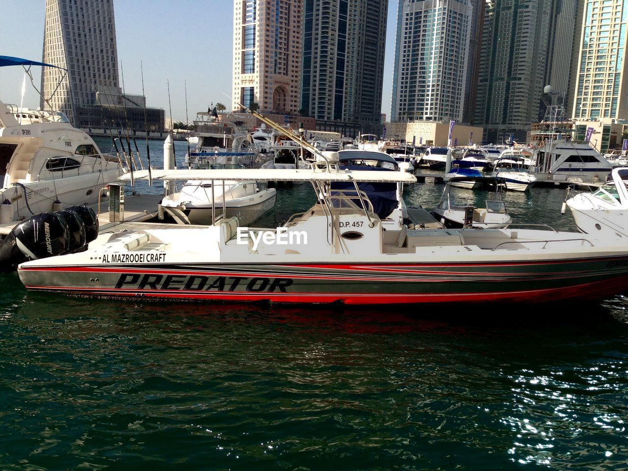 BOATS MOORED IN HARBOR