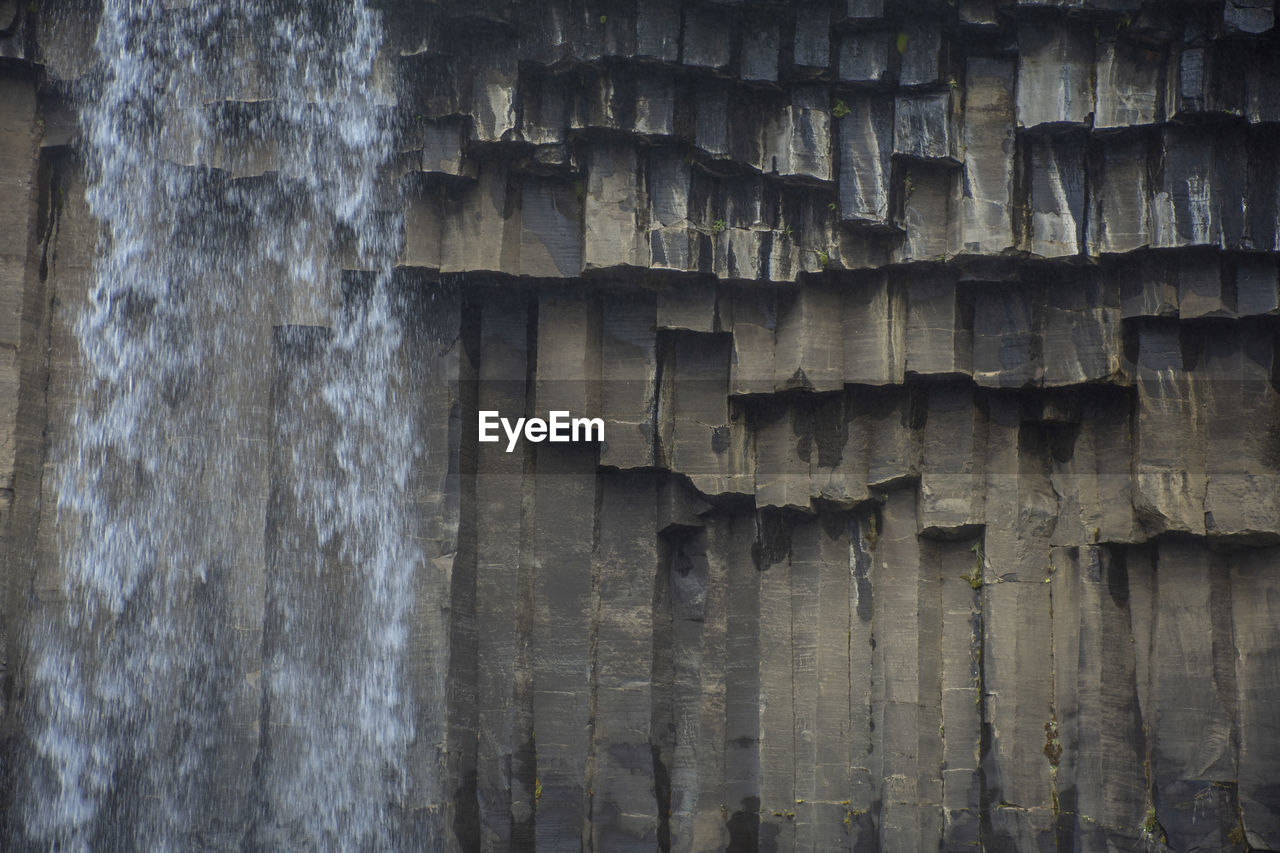 wall, no people, rock, textured, wall - building feature, pattern, architecture, day, formation, backgrounds, full frame, built structure, outdoors, wood, cave, nature, old, rough, weathered, close-up