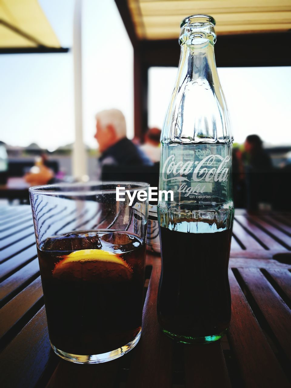 CLOSE-UP OF DRINKS IN GLASS ON TABLE