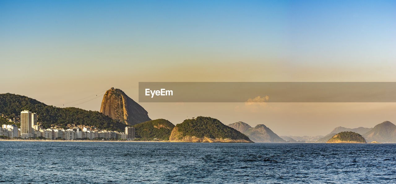 Copacabana beach and sugarloaf hill at dusk