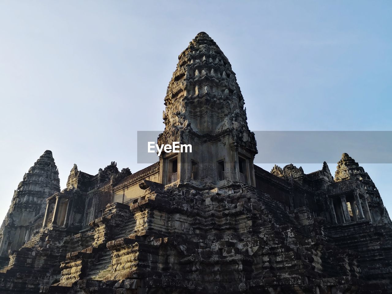 Low angle view of historical building against sky at angkor wat cambodia