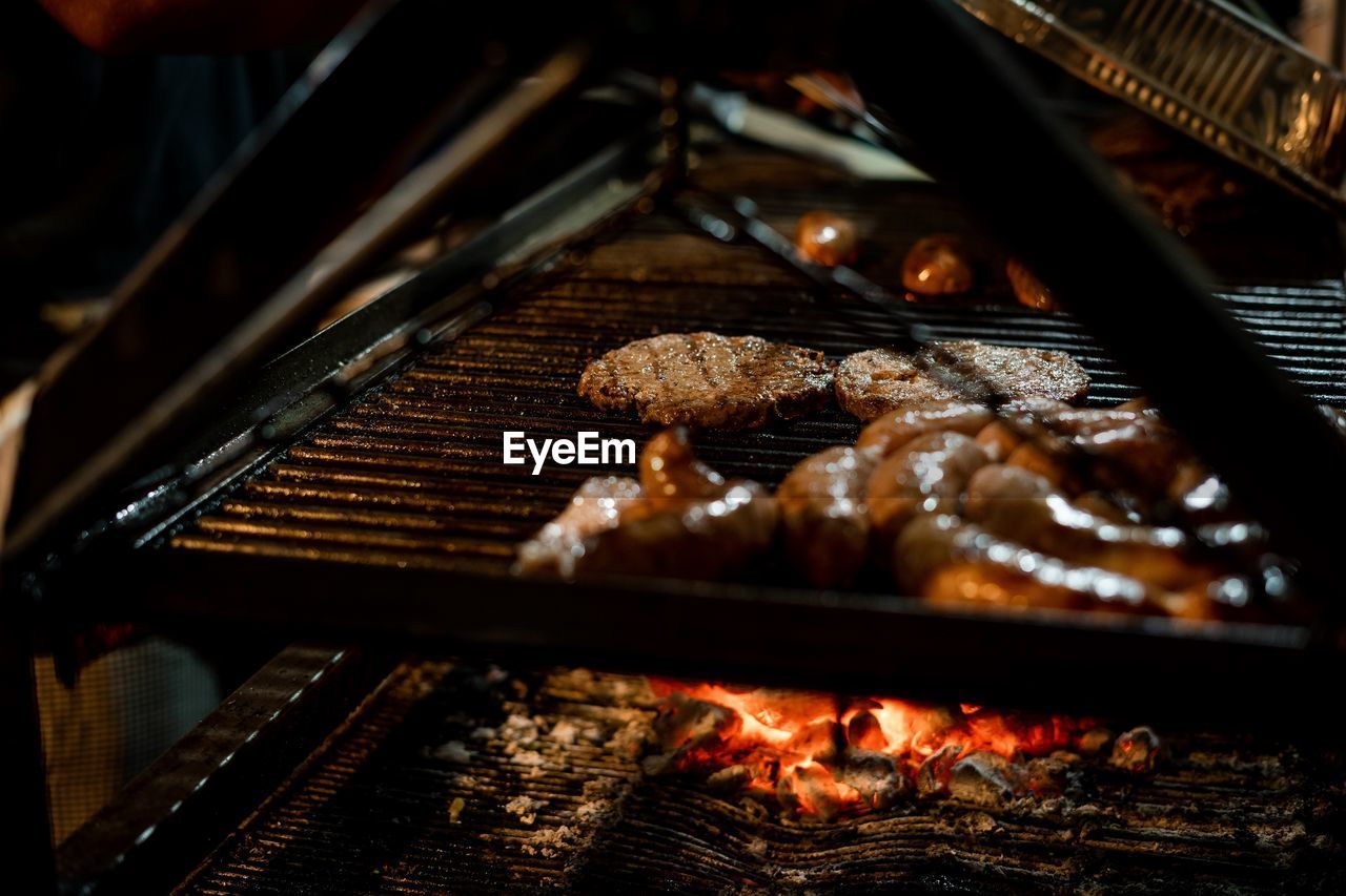 Close-up of meat on barbecue grill