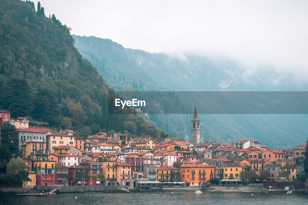 The little town of varenna sitting on the edge of lake como, italy.