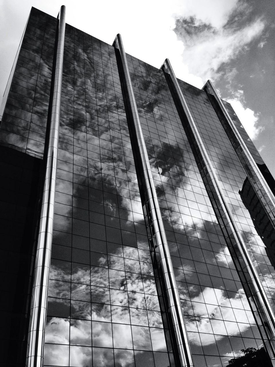 LOW ANGLE VIEW OF BUILDINGS AGAINST THE SKY