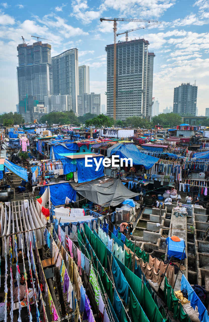 Mahalaxmi dhobi ghat is open air laundromat lavoir in mumbai, india with laundry dry on ropes