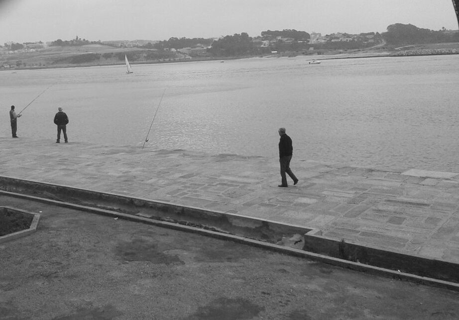 WOMAN STANDING IN WATER