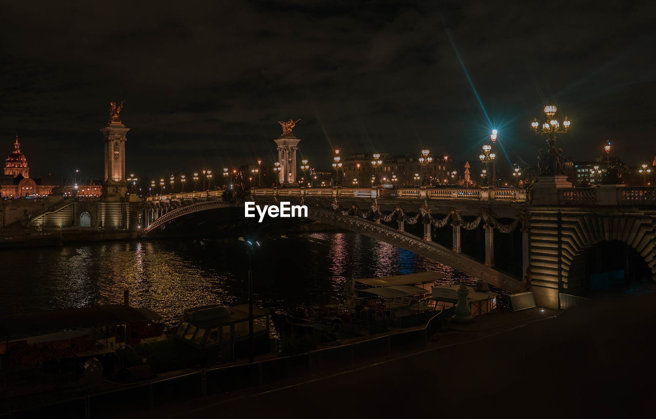 Night view of the alexander iii bridge, paris