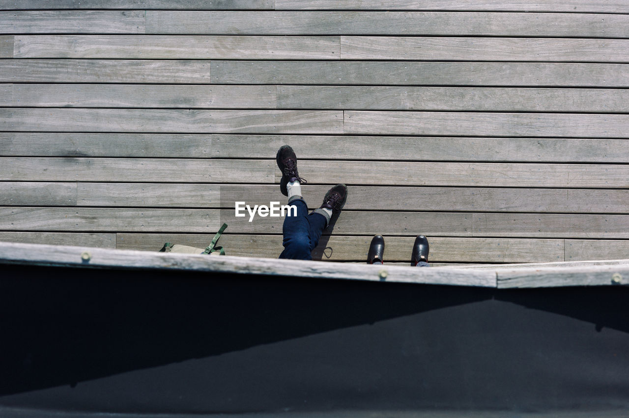 Low section of people on boardwalk