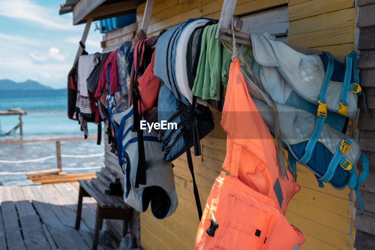 Life jackets or life preservers drying out in a sunny day.