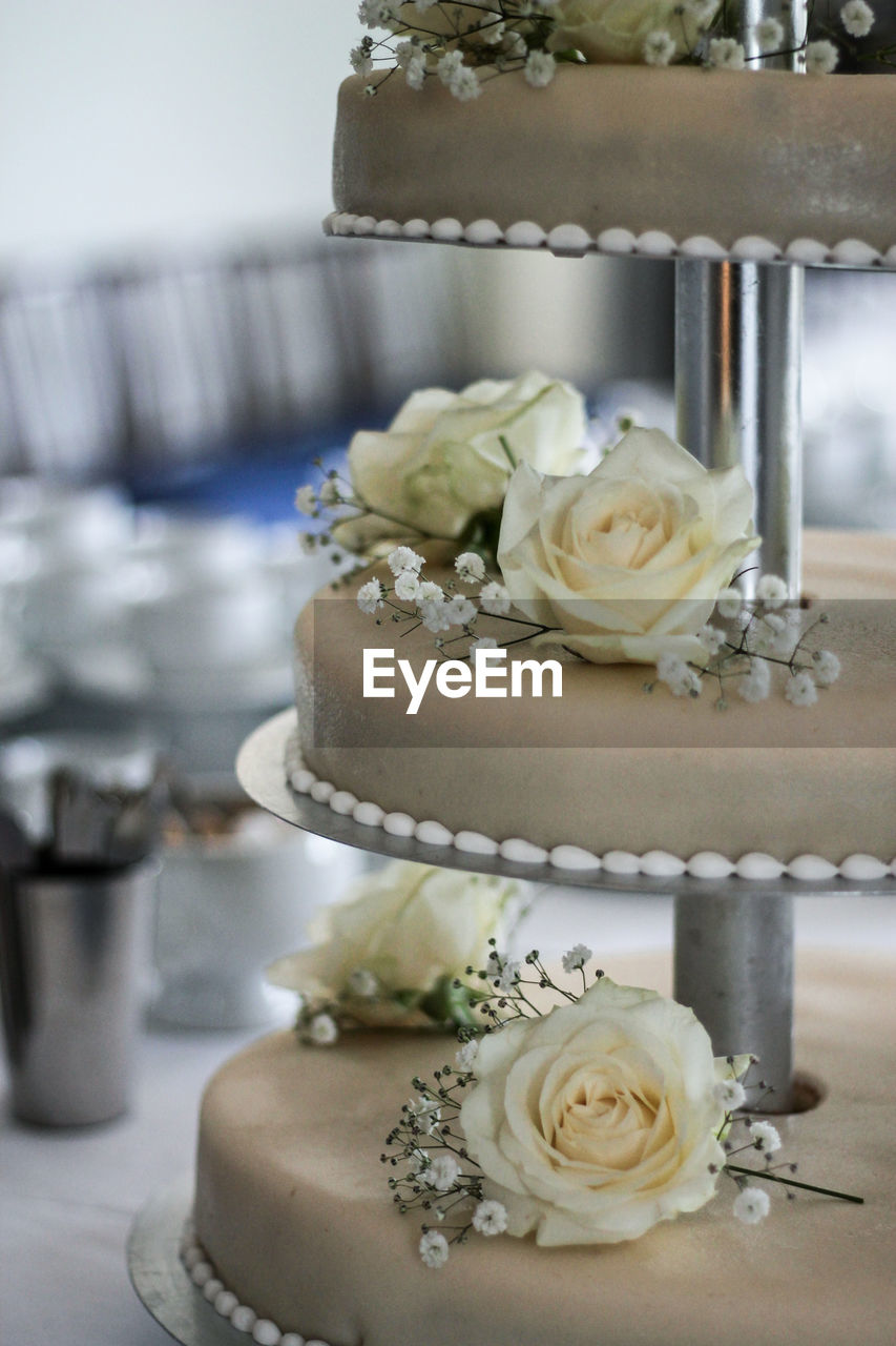 Close-up of wedding cake on table