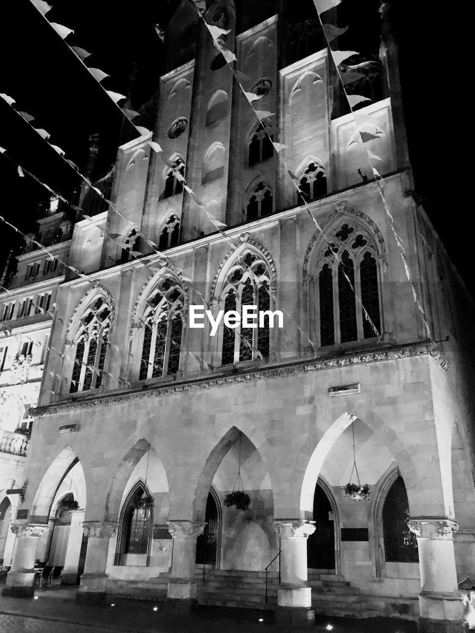 LOW ANGLE VIEW OF BUILDINGS AT NIGHT