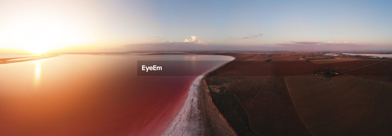 PANORAMIC VIEW OF SEA DURING SUNSET