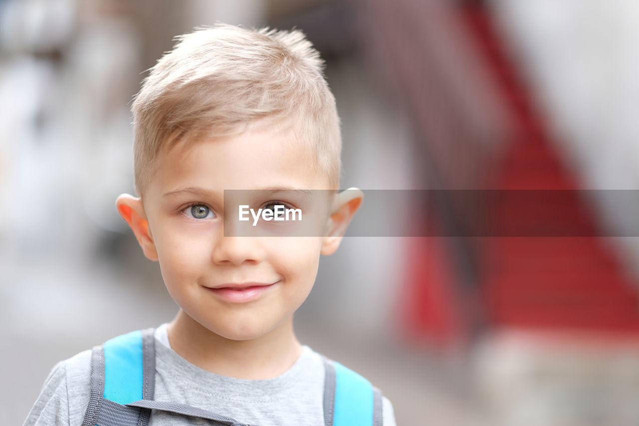 Close-up portrait of smiling boy