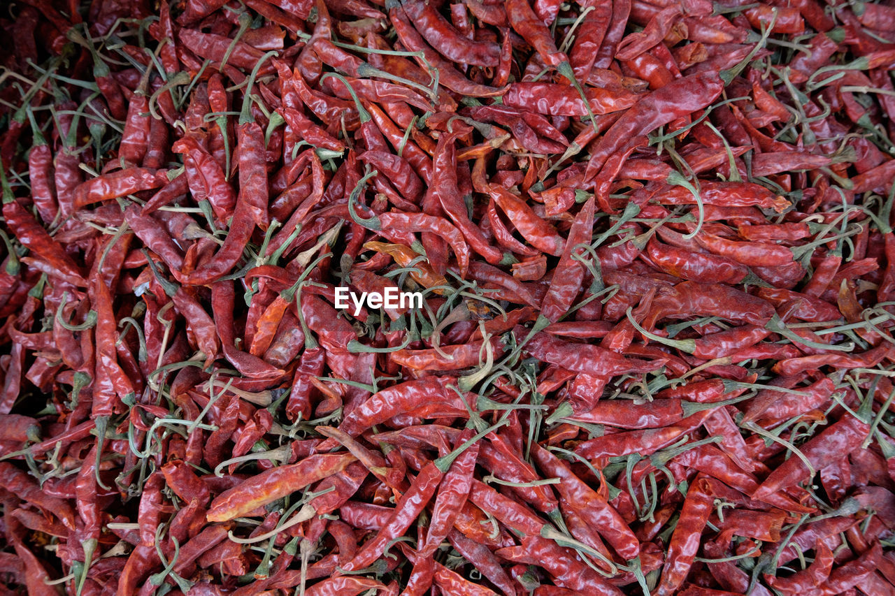 Full frame shot of red chili pepper for sale at market stall