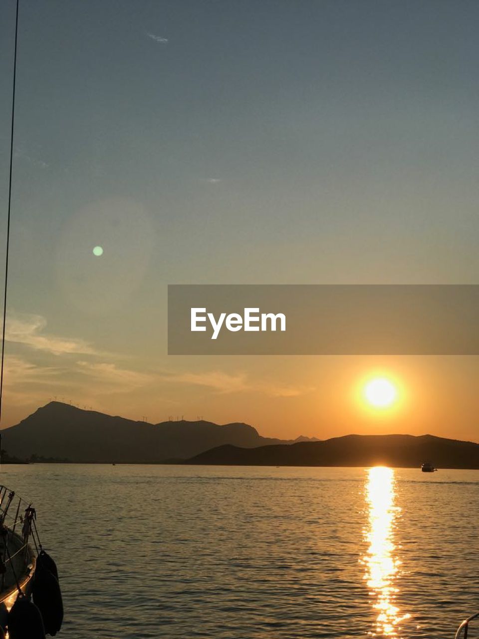 SCENIC VIEW OF LAKE DURING SUNSET