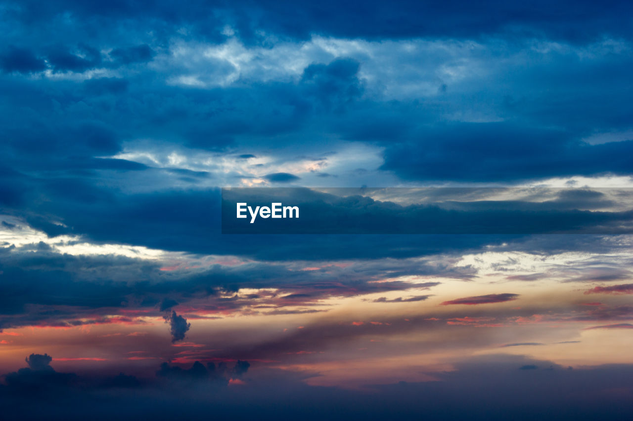 LOW ANGLE VIEW OF CLOUDY SKY DURING SUNSET