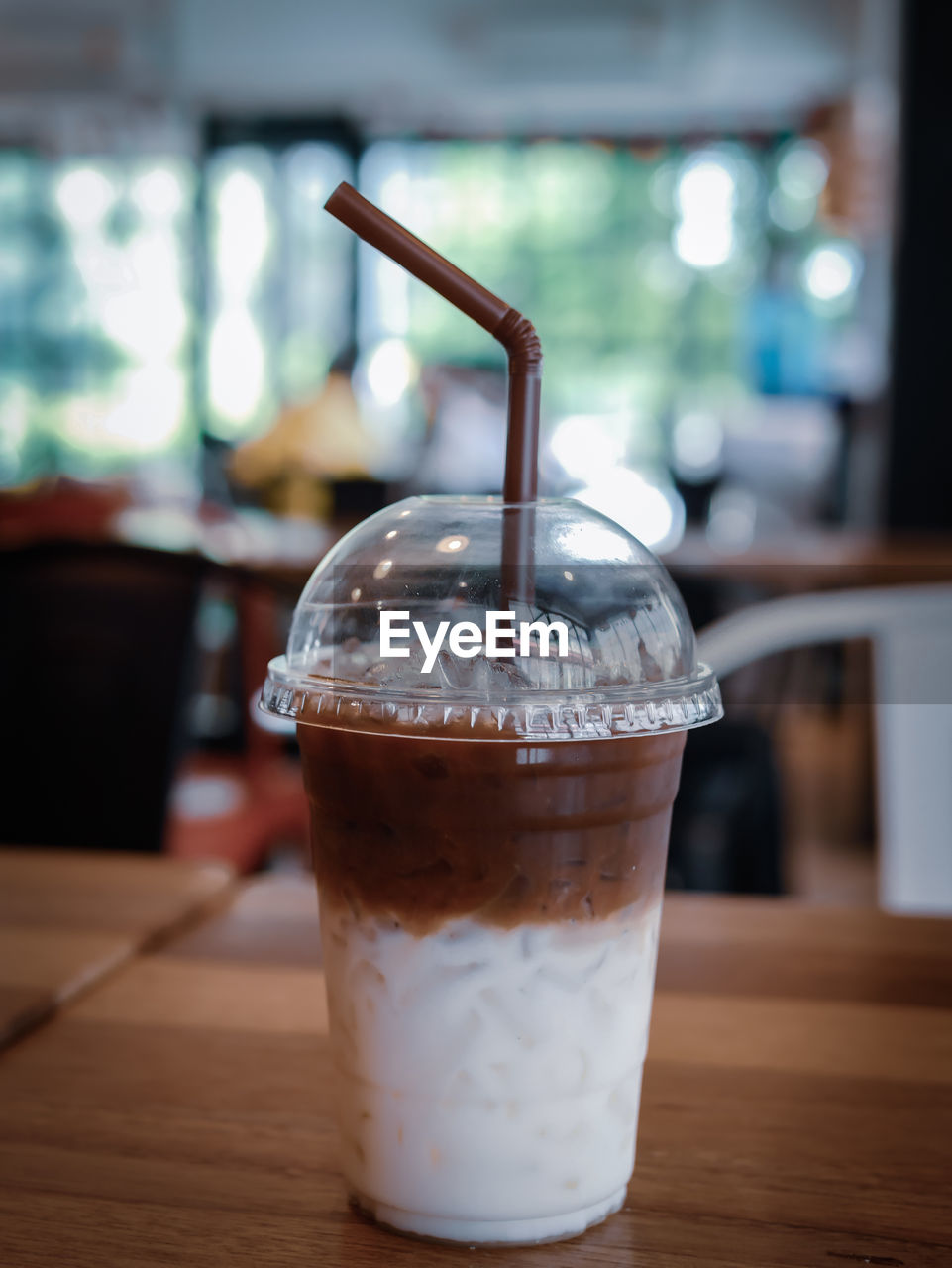 Close-up of coffee in glass on table